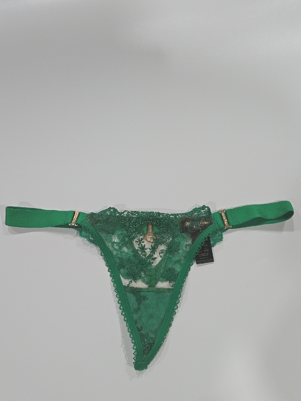 Green Lace Thong with Gold Hardware its use 1 Time  Like New Size XXs